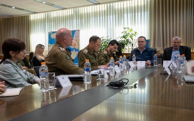 Defense Minister Israel Katz and Justice Minister Yariv meet with senior IDF and Justice Ministry officials at the Kirya on December 18, 2025 (Ariel Hermoni/Defense Ministry)