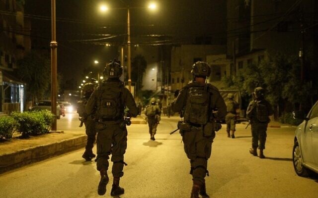 IDF troops operate in the West Bank city of Qalqiliya, early December 4, 2025. (Israel Defense Forces)