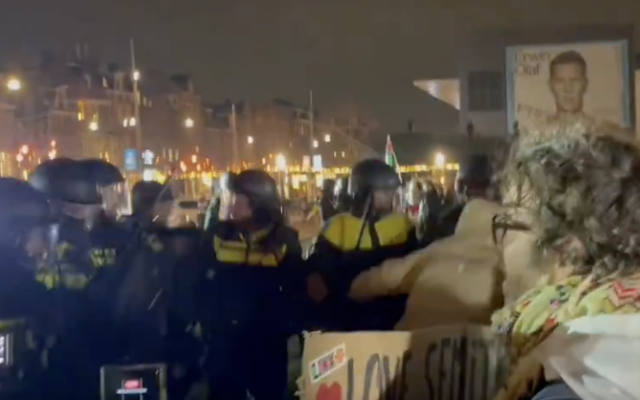 Police clash with protesters outside the Concertgebouw in Amsterdam during a series of Hanukkah-related events inside, some of which featured the official IDF cantor, Shai Abramson, December 14, 2025. (Screenshot via X, used in accordance with Clause 27a of the Copyright Law) Police clash with protesters outside the Concertgebouw in Amsterdam during a series of Hanukkah-related events inside, some of which featured the official IDF cantor, Shai Abramson, December 14, 2025. (Screenshot via X, used in accordance with Clause 27a of the Copyright Law)