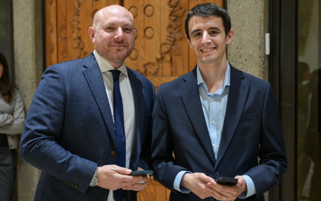 President Isaac Herzog's former international media advisor Jason Pearlman, left, and his replacement Benjamin Lee, in a photo published December, 17, 2025. (Maayan Toaf/GPO)