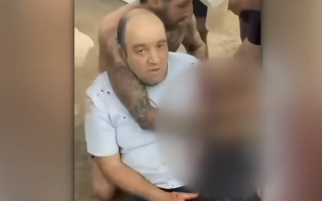 Ahmed al Ahmed, the bystander who tackled a gunman during the Sydney Hanukkah massacre, seen while being treated for his wounds on December 14, 2025. (Screenshot used in accordance with clause 27a of the coypright law)