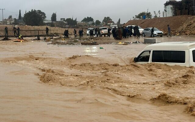 Rescuers attempting to reach a van trapped by floodwaters in southern Israel on December 28, 2025. (Courtesy; used in accordance with Clause 27a of the Copyright Law) Rescuers attempting to reach a van trapped by floodwaters in southern Israel on December 28, 2025. (Courtesy; used in accordance with Clause 27a of the Copyright Law)