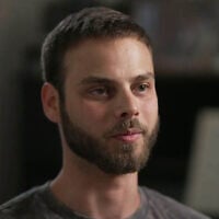 Surviving hostage Alon Ohel speaks with Channel 12 in an interview aired on December 1, 2025. (Screenshot/Channel 12)