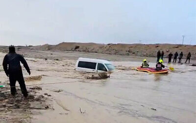 A vehicle is trapped amid a flood in southern Israel on December 28, 2025. (Screenshot via Kan on X, used in accordance with Clause 27a of the Copyright Law)