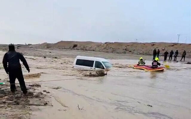 A vehicle is trapped amid a flood in southern Israel on December 28, 2025. (Screenshot via Kan on X, used in accordance with Clause 27a of the Copyright Law)