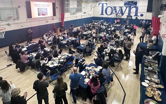 Students and parents at the Upper East Side's Town School celebrate the school's third annual Shabbat. (Pierangelo Rossi via JTA)