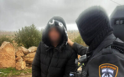 A man is arrested for allegedly impersonating an IDF soldier while robbing a jewelry store in the West Bank town of Dahariya, January 13, 2026. (Police Spokesperson's Unit)