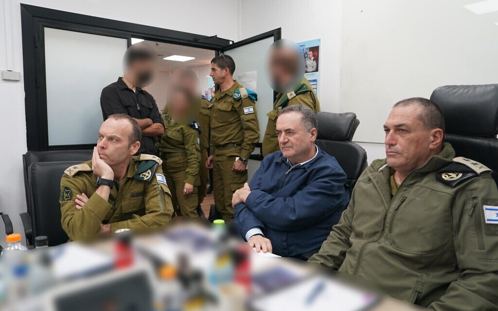 From left to right: Chief of Military Intelligence Maj. Gen. Shlomi Binder, Defense Minister Israel Katz, and Chief of Staff Lt. Gen. Eyal Zamir visiting an operational unit of the Military Intelligence Directorate, January 1, 2026. (Ariel Hermoni/Defense Ministry) From left to right: Chief of Military Intelligence Maj. Gen. Shlomi Binder, Defense Minister Israel Katz, and Chief of Staff Lt. Gen. Eyal Zamir visiting an operational unit of the Military Intelligence Directorate, January 1, 2026. (Ariel Hermoni/Defense Ministry)