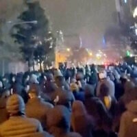 In this frame grab from footage circulating on social media from Iran showed protesters once again taking to the streets of Tehran despite an intensifying crackdown as the Islamic Republic remains cut off from the rest of the world in Tehran, Iran, January 10, 2026. (UGC via AP)