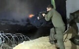 A screenshot from a video uploaded to social media by an IDF soldier in December 2025 showing him firing a volley of bullets. (Used in accordance with Clause 27a of the Copyright Law)