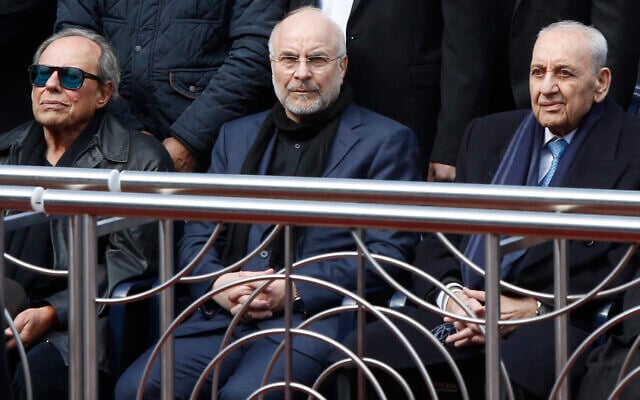 Iran's Parliament Speaker Mohammad Bagher Ghalibaf (center), flanked by Lebanese officials at the funeral of slain Hezbollah leaders Hassan Nasrallah and Hashem Safieddine in February 2025. (AFP)