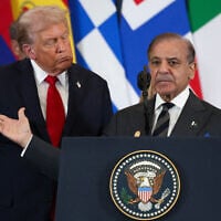 Pakistani Prime Minister Shehbaz Sharif (R) speaks as US President Donald Trump listens during the Gaza summit in Sharm El-Sheikh on October 13, 2025.  (Photo by Suzanne Plunkett / POOL / AFP)