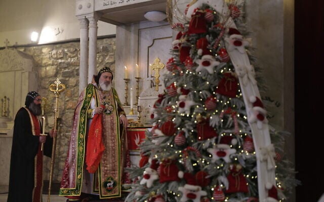Patriarch Mor Ignatius Aphrem II leads Christmas celebrations at St. George's Syriac Orthodox Church in the old city of Damascus on December 25, 2025. (Bakr Alkasem / AFP) Patriarch Mor Ignatius Aphrem II leads Christmas celebrations at St. George's Syriac Orthodox Church in the old city of Damascus on December 25, 2025. (Bakr Alkasem / AFP)