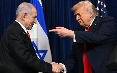 US President Donald Trump (R) and Prime Minister Benjamin Netanyahu shake hands as they arrive to speak to journalists during a joint press conference at Trump's Mar-a-Lago residence in Palm Beach, Florida, on December 29, 2025. (Jim Watson / AFP)