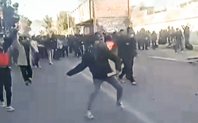 This screengrab taken on January 2, 2026, from UGC images posted on social media, shows protestors attacking a government building in Fasa, in southern Iran, on December 31, 2025, amid spontaneous nationwide protests driven by dissatisfaction at the country's economic stagnation. (UGC / AFP) This screengrab taken on January 2, 2026, from UGC images posted on social media, shows protestors attacking a government building in Fasa, in southern Iran, on December 31, 2025, amid spontaneous nationwide protests driven by dissatisfaction at the country's economic stagnation. (UGC / AFP)