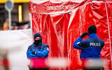 Police officers control the entrance to the bar Le Constellation where a fire ripped through the venue during New Year's celebrations in the Alpine ski resort town of Crans-Montana killing around 40 people and injuring more than 100 others, in Crans-Montana, Switzerland, on January 2, 2026. (MAXIME SCHMID / AFP)