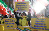 Protesters gather with placards outside the gates of Downing Street to attend a London Rally in Solidarity with Iran's Uprising, organized by The Association of Anglo-Iranian Women in the UK, in central London on January 3, 2026, to protest against the Iranian regime's crackdown on protests. (Brook Mitchell / AFP)