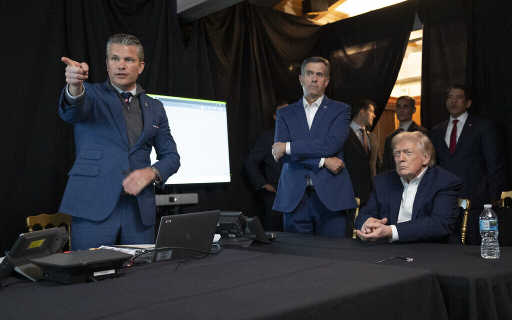 This image posted on US President Donald Trump's Truth Social account on January 3, 2026, shows, left to right: US Secretary of Defense Pete Hegseth, CIA Director John Ratcliffe, and President Donald Trump at Mar-a-Lago in Palm Beach, Florida, ostensibly watching a remote feed of the US military's mission to capture Venezuelan President Nicolas Maduro on January 3, 2026. (HANDOUT / US President Donald Trump's Truth Social account / AFP)