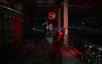 Lights are out at the S-Bahn train station at Mexikoplatz square in the district of Zehlendorf in southwest Berlin on early January 4, 2026, after power cables in the area were seriously damaged causing a power outage which left tens of thousands of households in the German capital without electricity. (Ralf Hirschberger/AFP)
