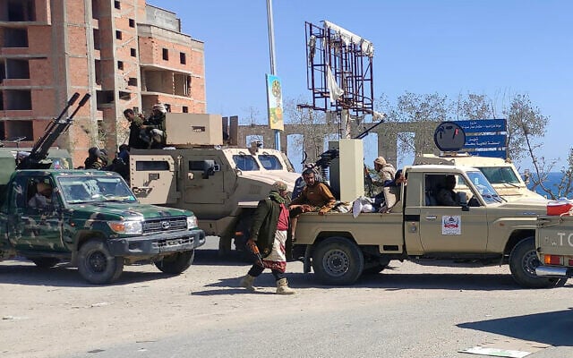 This photo taken on January 4, 2026, shows Saudi-backed forces deployed in the city of Mukalla in Yemen's coastal southern Hadramout province. (AFP)