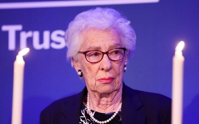 Eva Schloss, the step-sister of Anne Frank and honorary president of the Anne Frank Trust UK, takes part in a candle lighting ceremony during a reception to mark Holocaust Memorial Day and the 75th publication of Anne Frank's diary for the Anne Frank Trust in London, on January 20, 2022. (Chris Jackson / POOL / AFP)