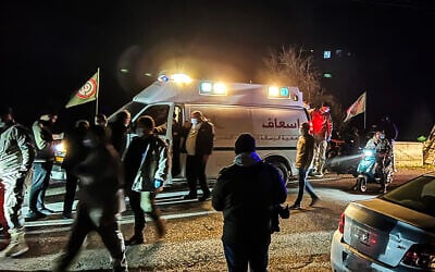 Emergency services and local citizens arrive at the scene following an Israeli strike on the village of Kfar Hatta, in southern Lebanon on January 5, 2026. (Mahmoud ZAYYAT / AFP) Emergency services and local citizens arrive at the scene following an Israeli strike on the village of Kfar Hatta, in southern Lebanon on January 5, 2026. (Mahmoud ZAYYAT / AFP)