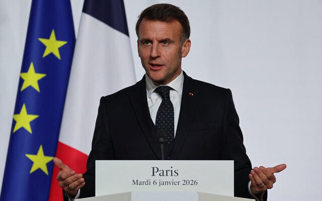 France's President Emmanuel Macron delivers a press conference upon the signing of the declaration on deploying a post-ceasefire force in Ukraine, at the Elysee Palace in Paris, January 6, 2026. (Ludovic MARIN / POOL / AFP)