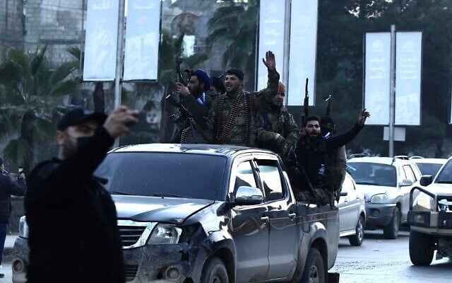 Security forces deployed near Aleppo's Sheikh Maqsud and Ashrafieh neighborhoods, on January 7, 2026. (Bakr ALkasem / AFP)