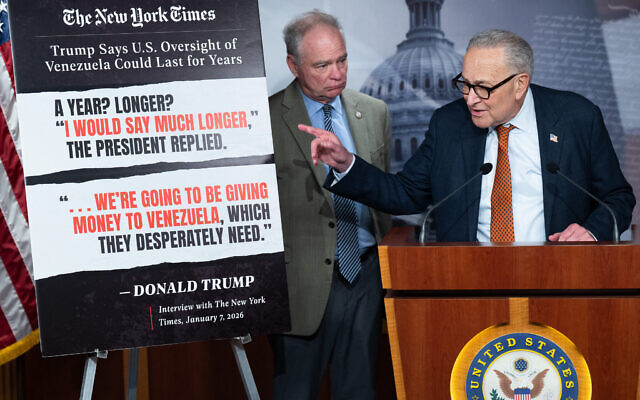 US Senate Minority Leader Chuck Schumer (Right), Democrat of New York, speaks alongside Senator Tim Kaine (Left), Democrat of Virginia, during a press conference after a US Senate vote on a War Powers Resolution blocking further US military action in Venezuela at the US Capitol in Washington, DC, January 8, 2026. (Saul Loeb/AFP) US Senate Minority Leader Chuck Schumer (Right), Democrat of New York, speaks alongside Senator Tim Kaine (Left), Democrat of Virginia, during a press conference after a US Senate vote on a War Powers Resolution blocking further US military action in Venezuela at the US Capitol in Washington, DC, January 8, 2026. (Saul Loeb/AFP)