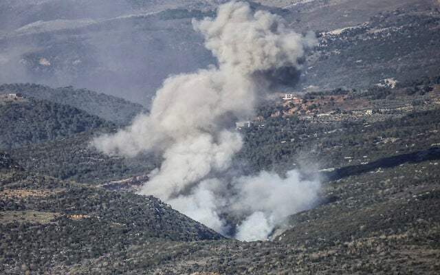 Smoke rises from the site of an Israeli airstrike that struck the hillsides near the southern Lebanese village of Al-Katrani on January 11, 2026. (Rabih DAHER / AFP) Smoke rises from the site of an Israeli airstrike that struck the hillsides near the southern Lebanese village of Al-Katrani on January 11, 2026. (Rabih DAHER / AFP)