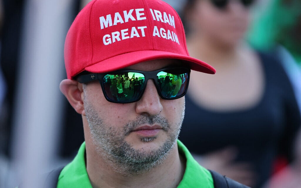 A man wears a Make Iran Great Again hat at a rally in Los Angeles, California, on January 11, 2026. (Jonathan Alcorn / AFP)