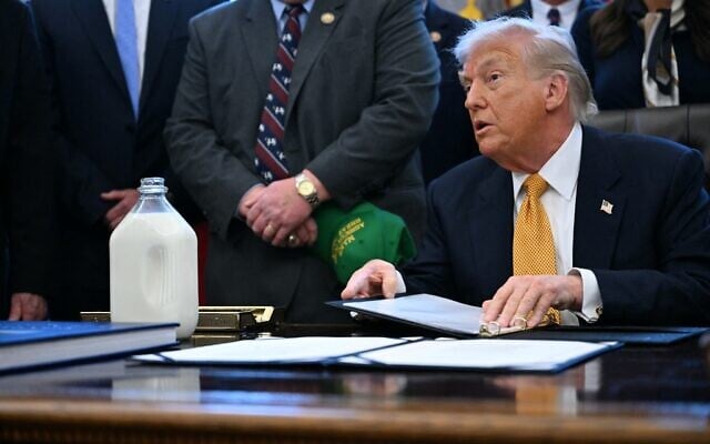 US President Donald Trump speaks before signing bills in the Oval Office of the White House in Washington, DC, on January 14, 2026. (Brendan Smialowski/AFP)