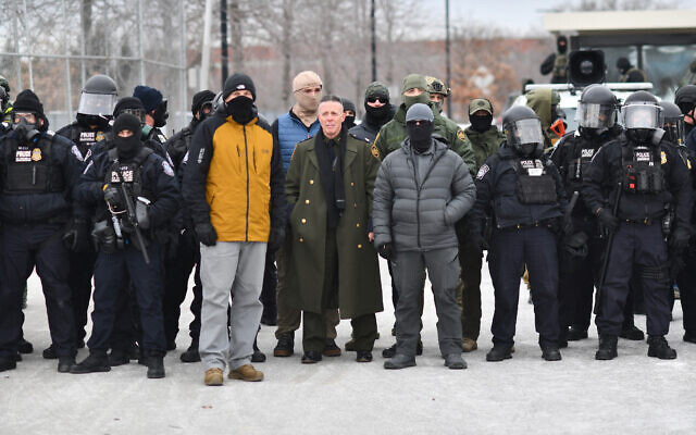 US Customs and Border Protection Commander Gregory Bovino (C) stands flanked by fellow federal agents during a protest against ICE outside the Bishop Whipple Federal Building in Minneapolis, Minnesota, on January 15, 2026. (Octavio JONES / AFP) US Customs and Border Protection Commander Gregory Bovino (C) stands flanked by fellow federal agents during a protest against ICE outside the Bishop Whipple Federal Building in Minneapolis, Minnesota, on January 15, 2026. (Octavio JONES / AFP)