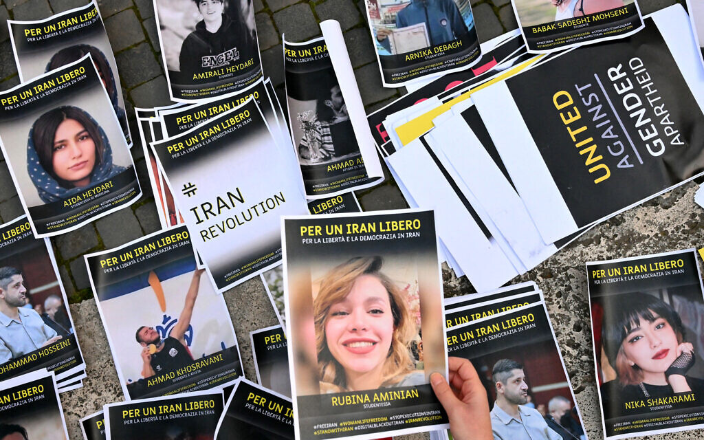 Placards showing Iranian protestors said to have been killed in the crackdown are seen during a rally in support of the Iranian people in Rome Capitoline Hill on January 16, 2026. (Alberto PIZZOLI / AFP)