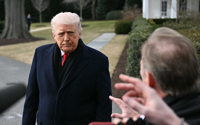US President Donald Trump speaks to the press before boarding Marine One as he departs from the South Lawn of the White House in Washington, DC, on January 16, 2026 (Brendan SMIALOWSKI / AFP)