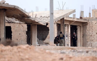 Illustrative: Syrian government forces deploy near the front line in Dibsi Faraj, in the northern Syrian Raqa province, on January 17, 2026. (OMAR HAJ KADOUR / AFP) Illustrative: Syrian government forces deploy near the front line in Dibsi Faraj, in the northern Syrian Raqa province, on January 17, 2026. (OMAR HAJ KADOUR / AFP)