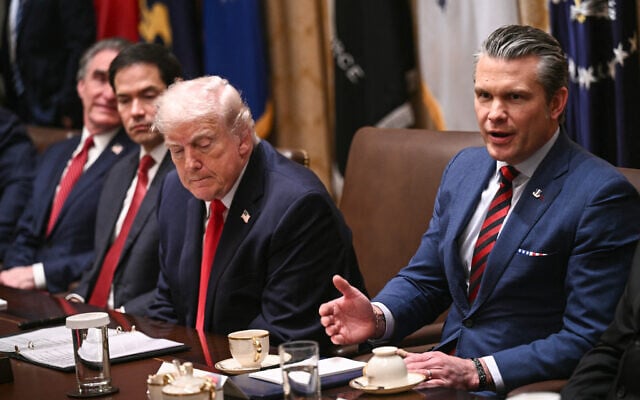 US President Donald Trump looks on as Secretary of Defense Pete Hegseth (R) speaks during a cabinet meeting in the Cabinet Room of the White House in Washington, DC, January 29, 2026. (Brendan SMIALOWSKI / AFP) US President Donald Trump looks on as Secretary of Defense Pete Hegseth (R) speaks during a cabinet meeting in the Cabinet Room of the White House in Washington, DC, January 29, 2026. (Brendan SMIALOWSKI / AFP)