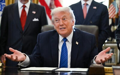 US President Donald Trump speaks before signing executive orders in the Oval Office in the White House in Washington, DC, on January 30, 2026. (ANNABELLE GORDON / AFP)