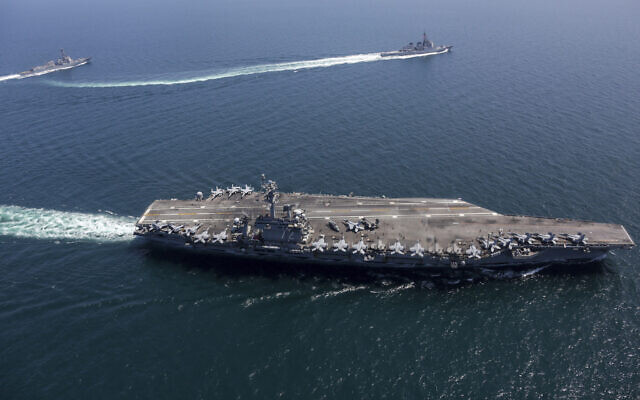 Illustrative: This undated photo provided by the US Navy on April 13, 2022, shows USS Abraham Lincoln, front, and other warships sail in formation during a US-Japan bilateral exercise at the Sea of Japan. (US Navy via AP) Illustrative: This undated photo provided by the US Navy on April 13, 2022, shows USS Abraham Lincoln, front, and other warships sail in formation during a US-Japan bilateral exercise at the Sea of Japan. (US Navy via AP)