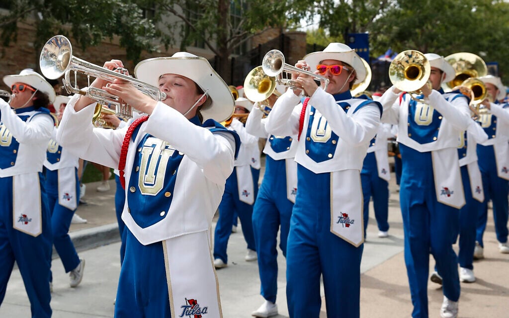 The Tulsa Marching Band performs before an NCAA college football game against Oklahoma, in Tulsa, Oklahoma, September 16, 2023. (AP Photo/Alonzo Adams) The Tulsa Marching Band performs before an NCAA college football game against Oklahoma, in Tulsa, Oklahoma, September 16, 2023. (AP Photo/Alonzo Adams)