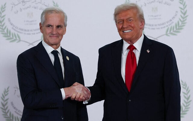 US President Donald Trump (right) greets Norway's Prime Minister Jonas Gahr Støre during a summit to support ending the more than two-year Israel-Hamas war in Gaza, October 13, 2025, in Sharm El Sheikh, Egypt. (Suzanne Plunkett/Pool via AP)