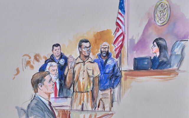 This courtroom sketch depicts Brian Cole Jr., 30, of Woodbridge, Virginia, the man accused of planting a pair of pipe bombs outside the headquarters of the Republican and Democratic national parties on January 5, 2021, in Washington, being sworn in, Friday, Dec. 5, 2025 before US Magistrate Moxila Upadhyaya, at Federal Court in Washington, as US Attorney Charles Jones, seated left, and Defense Attorney John Shoreman, seated center, look on. (Dana Verkouteren via AP) This courtroom sketch depicts Brian Cole Jr., 30, of Woodbridge, Virginia, the man accused of planting a pair of pipe bombs outside the headquarters of the Republican and Democratic national parties on January 5, 2021, in Washington, being sworn in, Friday, Dec. 5, 2025 before US Magistrate Moxila Upadhyaya, at Federal Court in Washington, as US Attorney Charles Jones, seated left, and Defense Attorney John Shoreman, seated center, look on. (Dana Verkouteren via AP)
