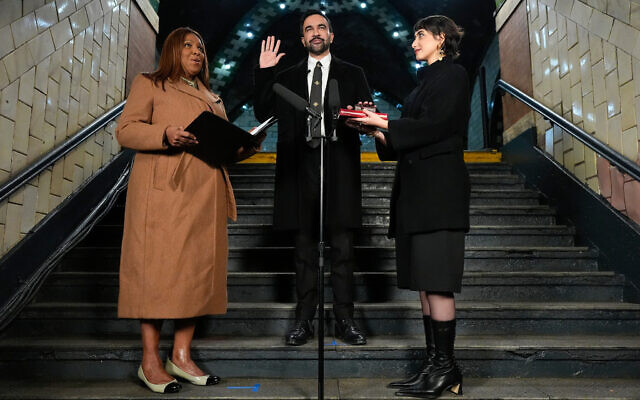 New York State Attorney General Letitia James (left) administers the oath of office to Mayor-elect Zohran Mamdani (center) as his wife Rama Duwaji looks on, January 1, 2026, in New York City. (AP/Yuki Iwamura) New York State Attorney General Letitia James (left) administers the oath of office to Mayor-elect Zohran Mamdani (center) as his wife Rama Duwaji looks on, January 1, 2026, in New York City. (AP/Yuki Iwamura)