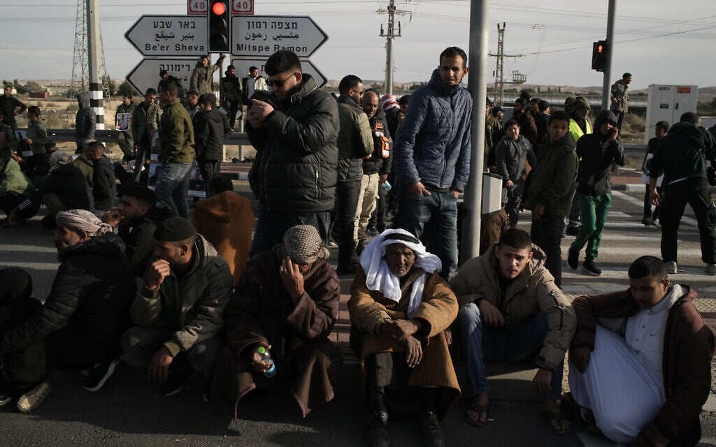 Bedouins protest Israeli police raids in their towns and against discrimination toward their community, January 1, 2026, on a road near the village of Bir Hadaj in southern Israel. (AP/Leo Correa)