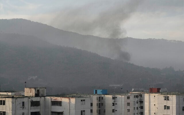 Smoke rises from Fort Tiuna, the main military garrison in Caracas, Venezuela, after multiple explosions were heard and aircraft swept through the area, January 3, 2026. (AP Photo/Matias Delacroix) Smoke rises from Fort Tiuna, the main military garrison in Caracas, Venezuela, after multiple explosions were heard and aircraft swept through the area, January 3, 2026. (AP Photo/Matias Delacroix)