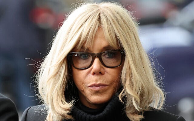 French President's wife Brigitte Macron arrives ahead of the ceremony outside 'La Belle Equipe' bar, Nov. 13, 2025 in Paris (Ludovic Marin, Pool photo via AP, File)