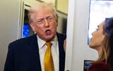 US President Donald Trump speaks with reporters while in flight on Air Force One, on January 4, 2026, as they were returning to Joint Base Andrews, Md. (AP/Alex Brandon)