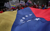 Demonstrators protest the capture of Venezuelan President Nicolas Maduro by US forces, Rio de Janeiro, January 5, 2026. (AP/Bruna Prado)