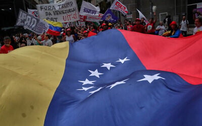 Demonstrators protest the capture of Venezuelan President Nicolas Maduro by US forces, Rio de Janeiro, January 5, 2026. (AP/Bruna Prado)