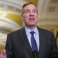 US Sen. Mark Warner, Democrat of Virginia, speaks at a news conference after a policy luncheon at the US Capitol, Tuesday, January 6, 2026, in Washington, DC. (AP/Rod Lamkey, Jr.)